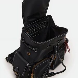 Black Backpack with Gold Accents